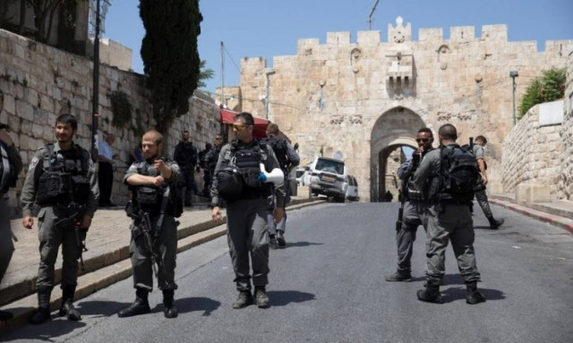Israeli police killed in attack near Jerusalem holy site