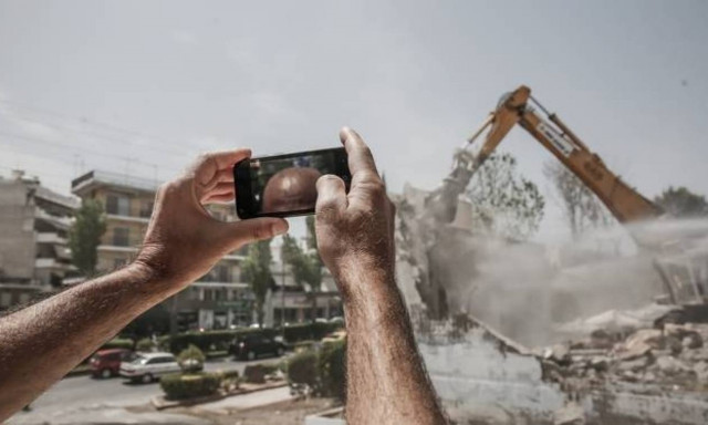 Wall of old Korydallos women's prison knocked down to create park