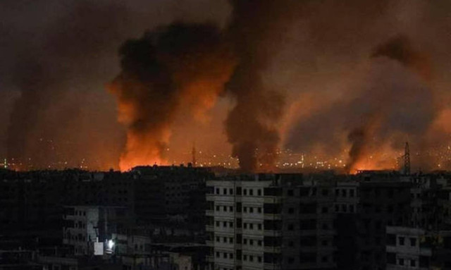 Syria war: 'Iranian personnel among dozens dead' in missile attacks