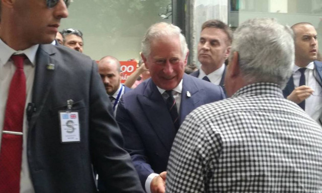 Prince of Wales and Duchess of Cornwall take a stroll through Athens, meet citizens