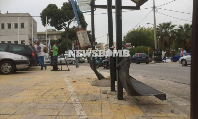 One dead, three injured after car crashes into bus stop