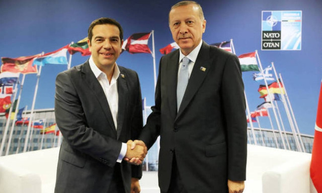 PM Tsipras raises issue of two detained Greek servicemen at meeting with Turkish President Erdogan