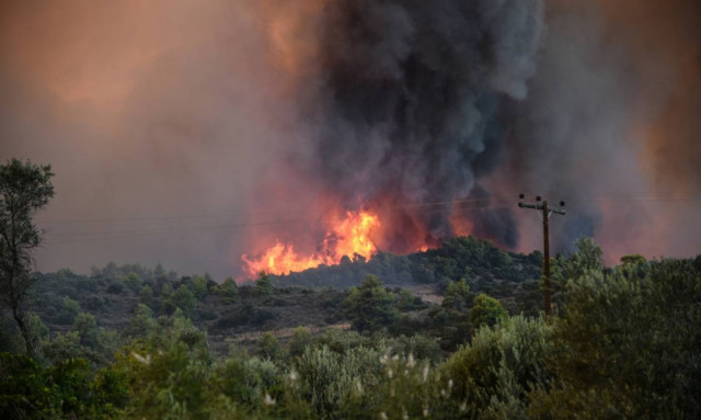 Authorities evacuate residents of two villages on path of Evia fire