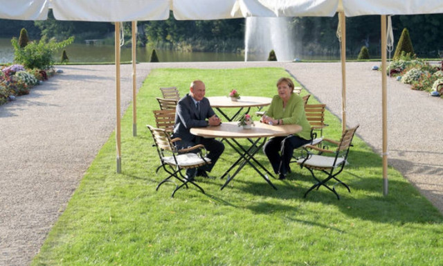 Με τους καλύτερους οιωνούς και καλή... θέληση συνάντηση Πούτιν – Μέρκελ (vids+pics)