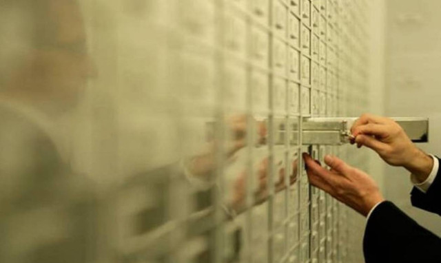 Investigation into bank employees stealing from safe deposit boxes reopens