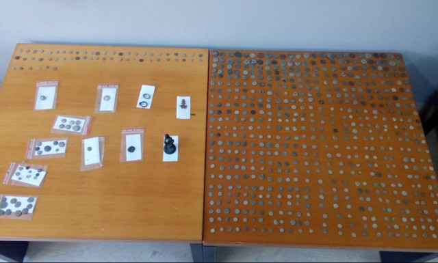 Man, 55, discovered with 693 ancient coins and other items in his possession