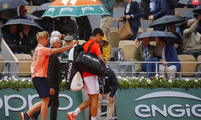 Ρολάν Γκαρός: Η βροχή νίκησε Τζόκοβιτς και Τιμ (photos) 