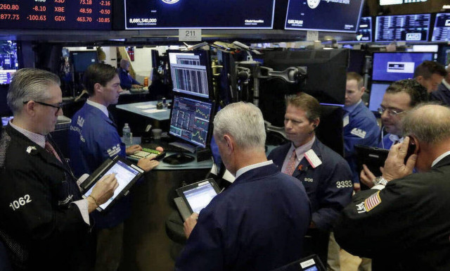 Η Fed «έσωσε» στο τέλος τη Wall Street - Νέα πτώση στην τιμή του πετρελαίου