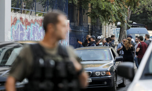 Police raid two buildings in Athens occupied by migrants and refugees