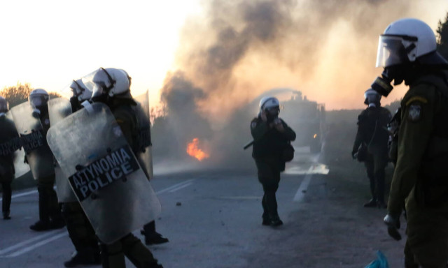 Clashes between riot police and protesting citizens on Mytilene