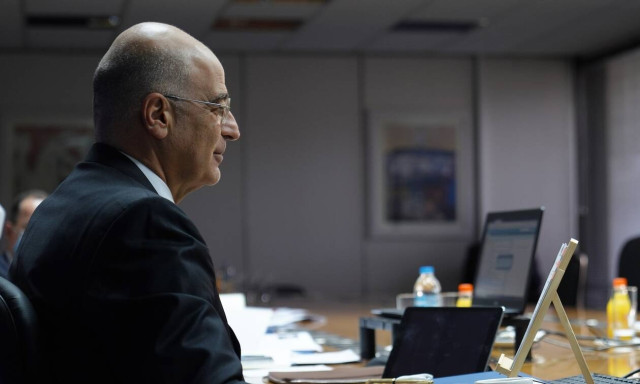 Turkey trying to create faits accomplis while avoiding sanctions, Dendias said