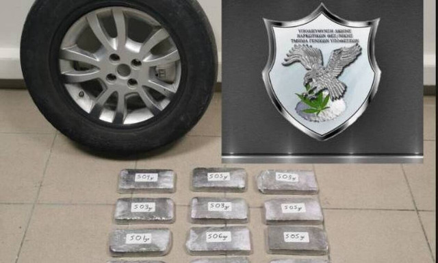 Over five kilos of heroin found in a car's spare tire; the driver led to prosecutor	