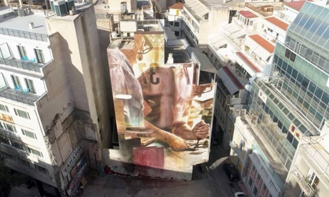 Εξάρχεια: Αυτός είναι ο Αυστραλός καλλιτέχνης που δημιούργησε τη νέα εντυπωσιακή τοιχογραφία