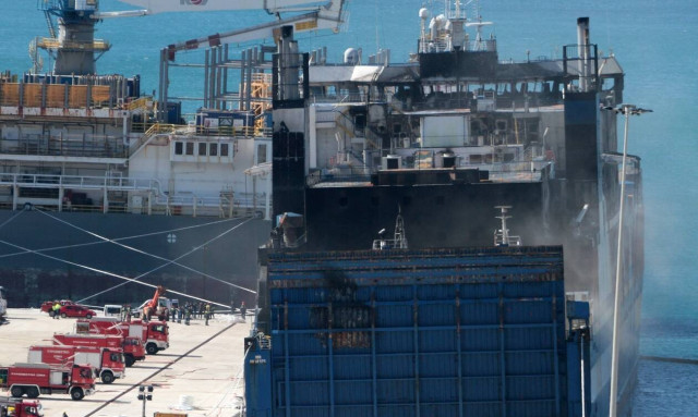 Fifth body found on burnt 'Euroferry Olympia' ship; six people still missing