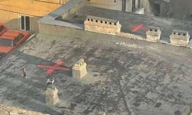 Πόλεμος στην Ουκρανία: Τι σημαίνουν τα σύμβολα που βρέθηκαν σε κτήρια μετά τη ρώσικη εισβολή