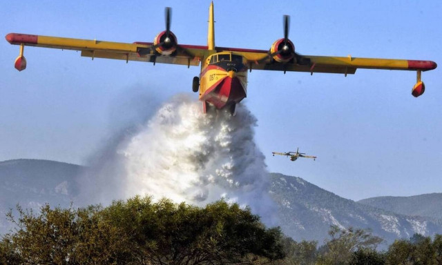 Greece sends two Canadair fire-fighting planes to help put out raging wildfires in France
