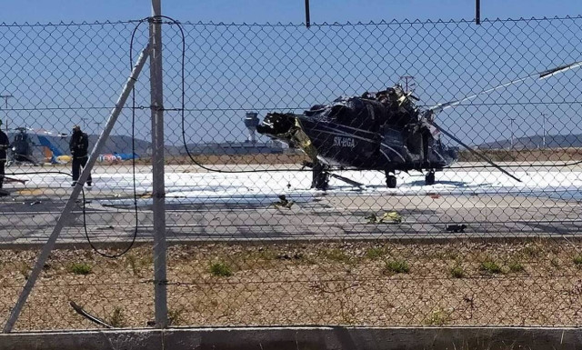 Helicopter on fire at Eleftherios Venizelos airport, pillot rescued