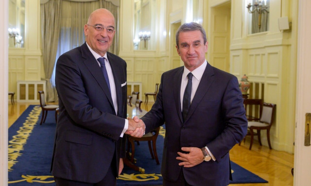 Dendias briefs PASOK-KINAL's Loverdos on latest developments