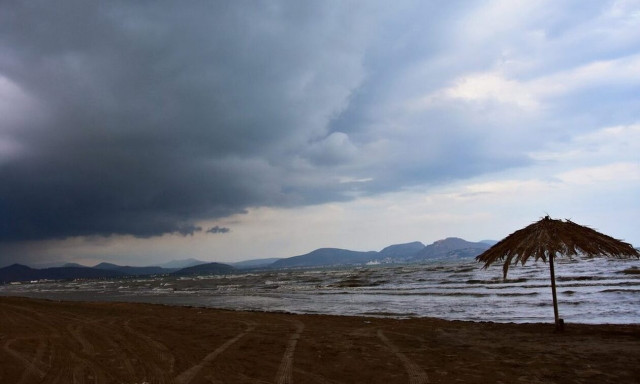 Mostly cloudy with intervals of heavy rain on Monday