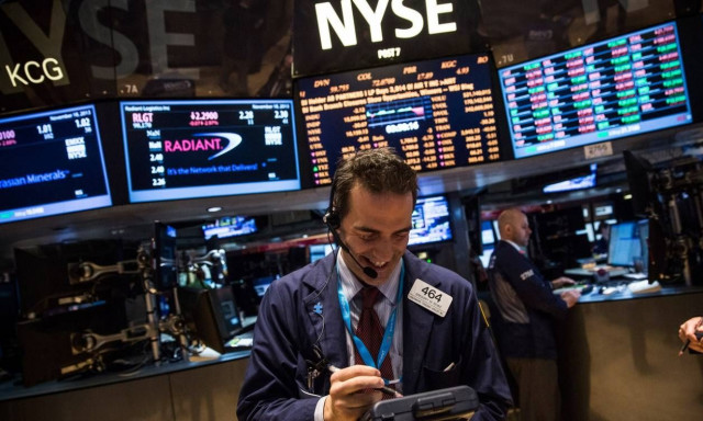 Σε ρυθμούς μείωσης επιτοκίων η Wall Street - Νέα ρεκόρ από Dow Jones και S&P