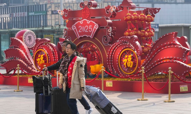 Κίνα : Έρχεται η «χρονιά του φιδιού» - Ταξίδια, δώρα αλλα και φόβοι για την οικονομία