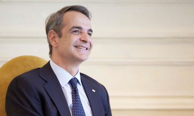 Mitsotakis visiting Berlin