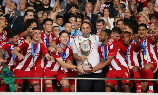 Σήκωσαν το Κύπελλο Μαρινάκης, Ρέτσος, Ελ Κααμπί