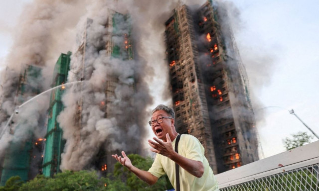 Η φωτογραφία που έγινε σύμβολο για την φονική πυρκαγιά στο Χονγκ Κονγκ