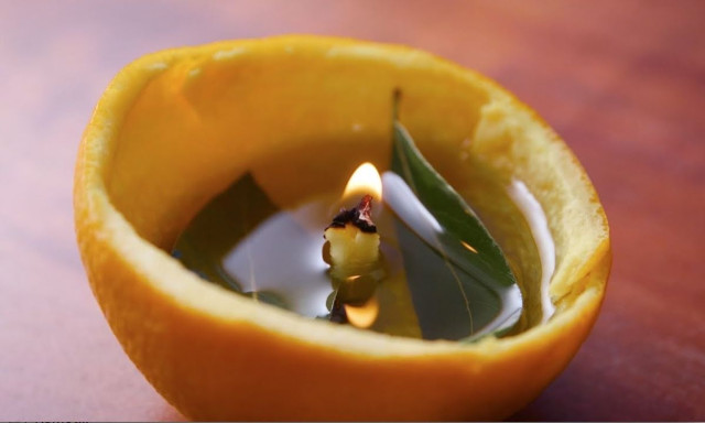 Πώς να φτιάξετε αρωματικό κερί από ένα πορτοκάλι: Ξανάγινε viral το κόλπο με πραγματικά οφέλη