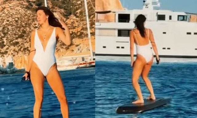 Η Μαρίνα Βερνίκου εντυπωσιάζει κάνοντας surfing στα καταγάλανα νερά της Σαντορίνης - Βίντεο