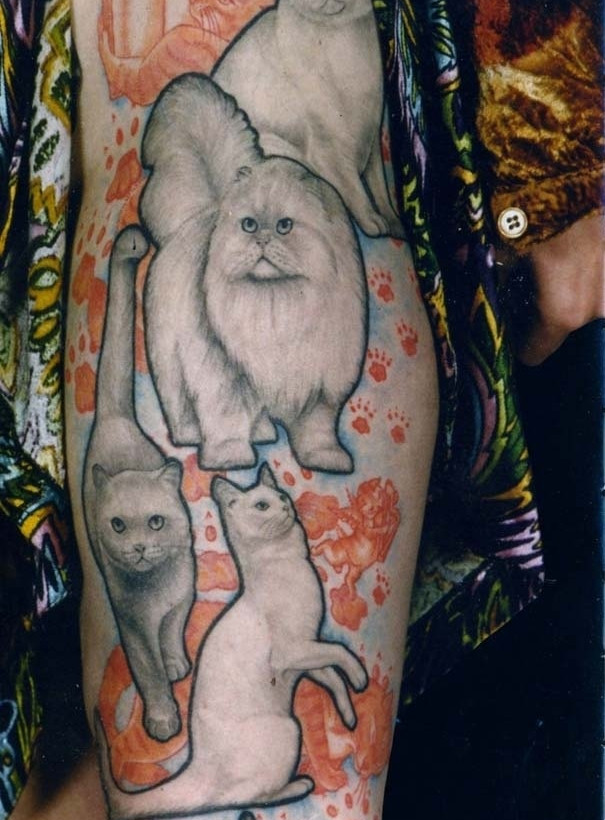 Λατρεύουν τις γάτες και τις έκαναν τατουάζ!(pics)