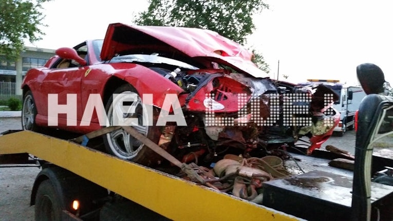 Ferrari stuck between trees! (pics)