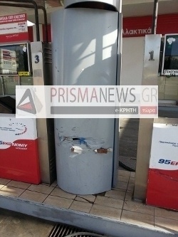 Car struck in a gus station (pic)