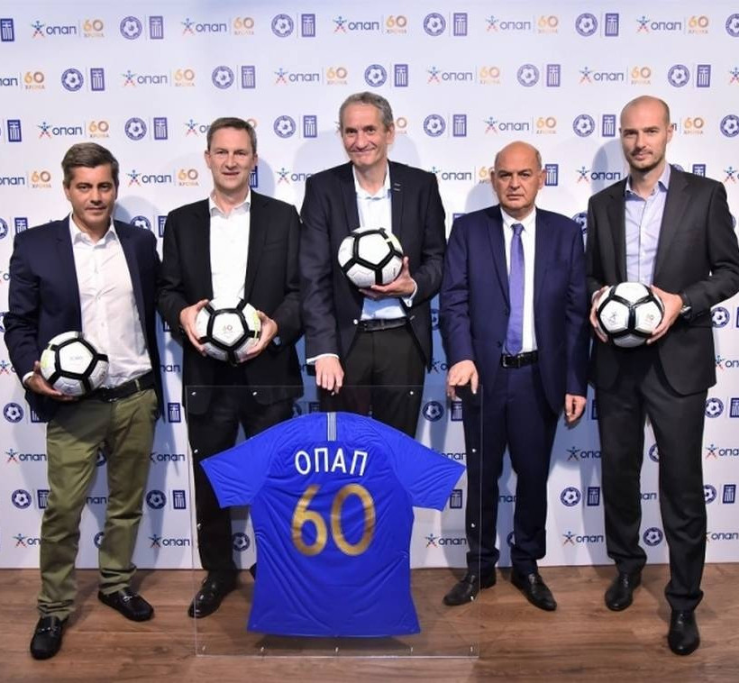 Οδυσσέας Χριστοφόρου - Επικεφαλής Εταιρικών και Ρυθμιστικών Υποθέσεων ΟΠΑΠ, Ντάμιαν Κόουπ – Διευθύνων Σύμβουλος ΟΠΑΠ, Καμίλ Ζίγκλερ – Εκτελεστικός Πρόεδρος ΟΠΑΠ, Βαγγέλης Γραμμένος – Πρόεδρος ΕΠΟ, Πέτρ Ματεγιόφσκι - Chief Customer Officer ΟΠΑΠ