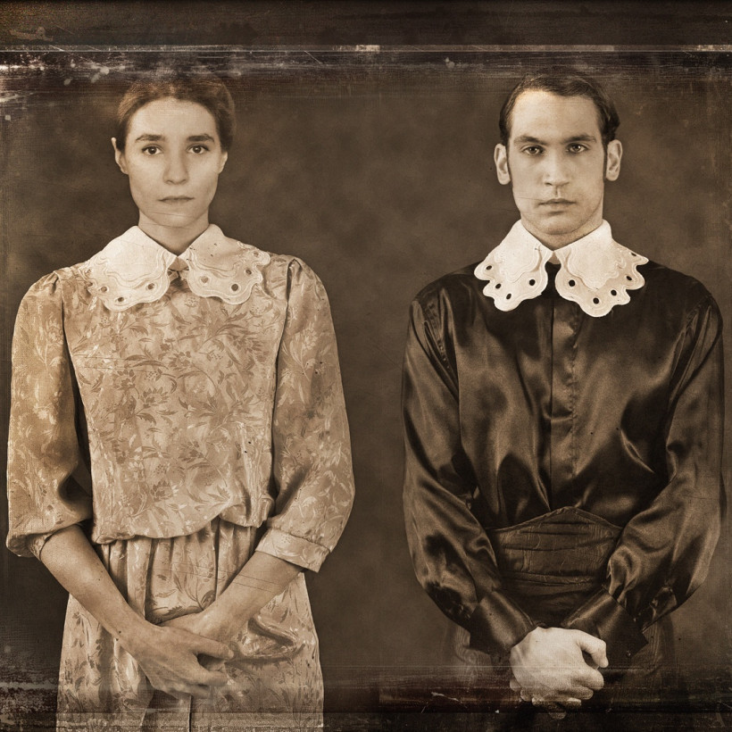 Vintage distressed old photo light leaks, film grain, dust and scratches texture overlay with vignette border. Dirty grunge analog 8k widescreen retro effect background with copy space