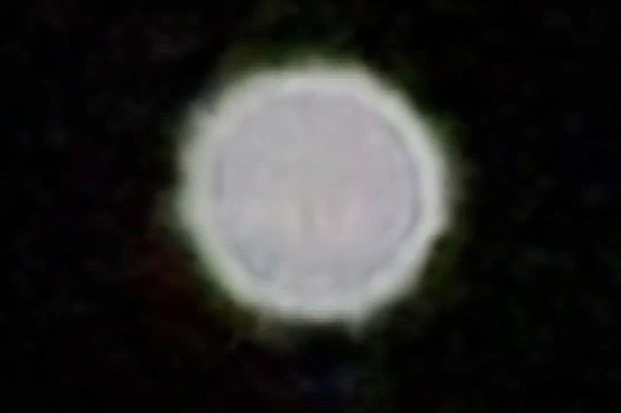 A Florida-bound flight crew witnessed strange orbs glowing and darting around in the night sky while flying over the Bahamas at high altitude.