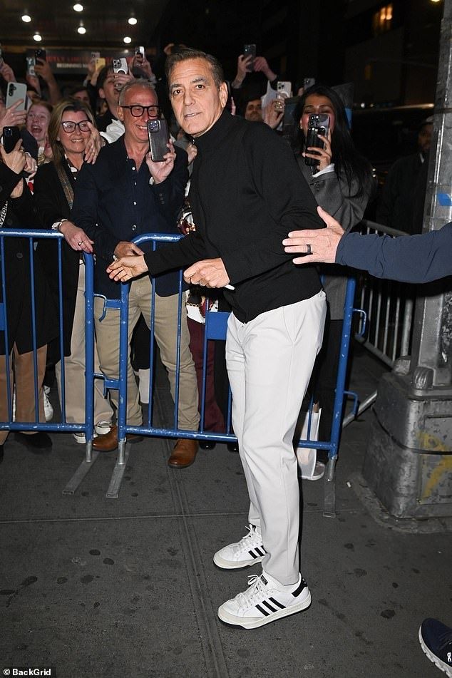 Following a preview of his Broadway show, Good Night and Good Luck, the actor took time to meet with fans. The former silver fox looked sharp as he rocked his dark hair
