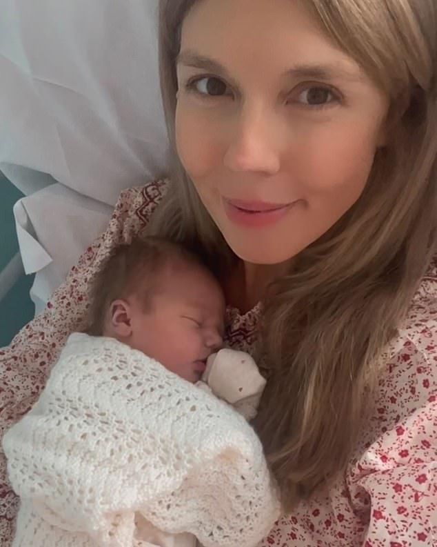 Mrs Johnson, 37, said they are 'totally smitten' with their new baby girl whom they have named Poppy Eliza Josephine Johnson