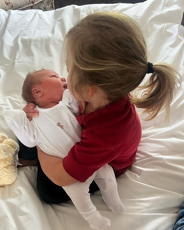 Poppy has become little sister to Wilfred, Romy and Frank who are 'utterly delighted' to welcome a new member of the family