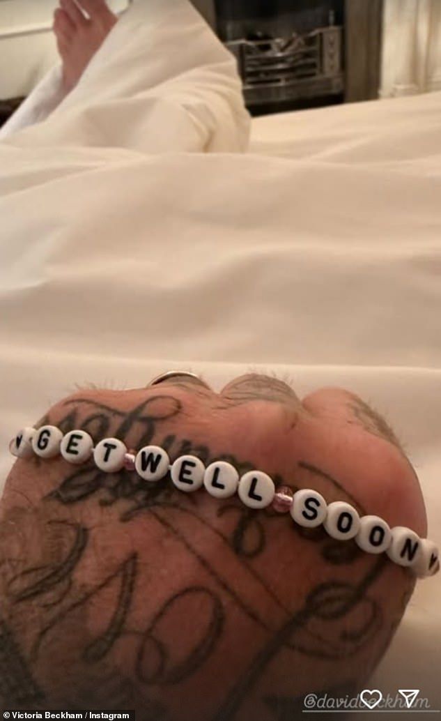 A second photo showed David with a bracelet that read: 'Get well soon'