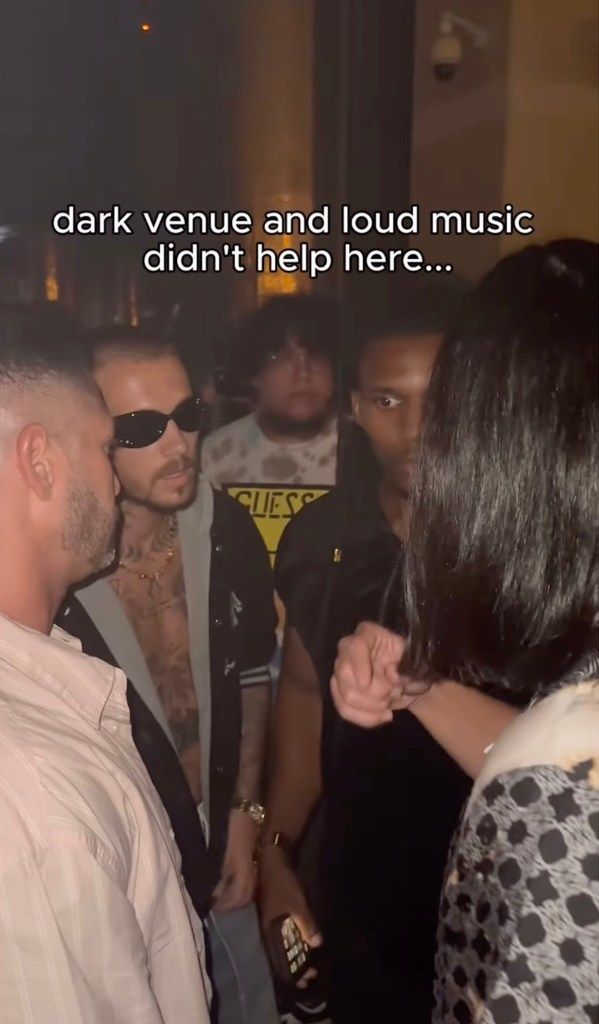 A Justin Bieber impersonator being confronted in a Las Vegas nightclub.