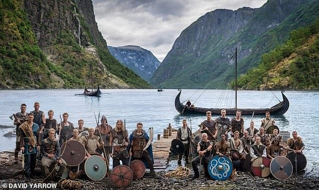 The squad were pictured on the edge of a beach in Oslo for the remarkable photos